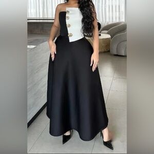 Elegant Black and White Women's Skirt with Gold Button Halter Top